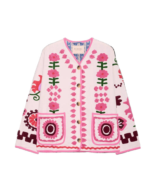 Embroidered pink cardigan with floral patterns on a black background