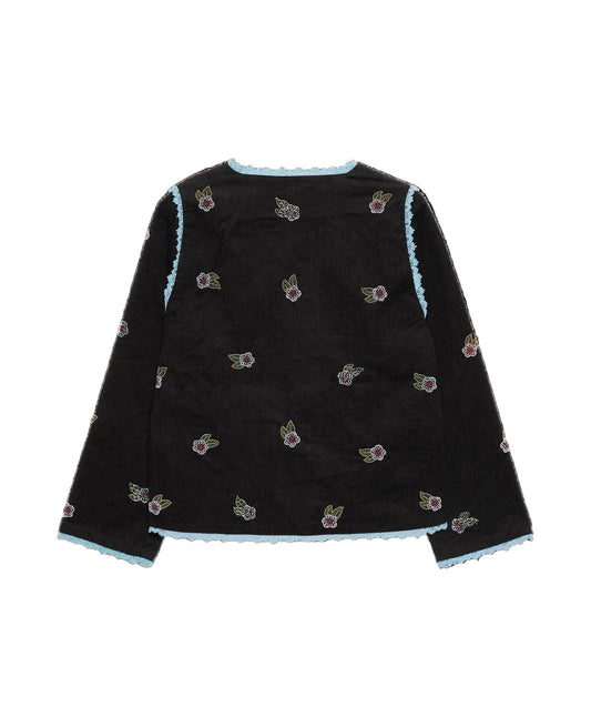 Black quilted jacket with floral embroidery on a white background