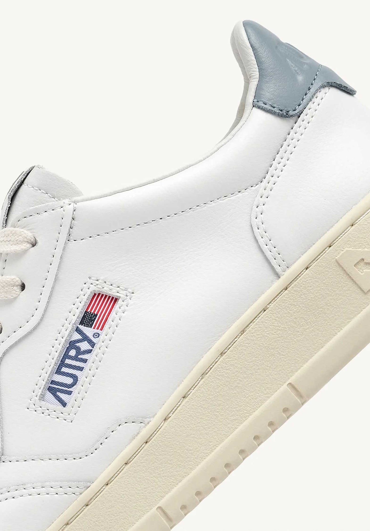 Autry | Medalist Low Sneaker - White, Silver & Blue White-Silver-Blue